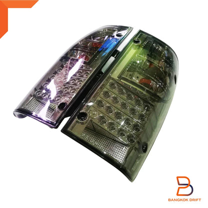 Smoked LED Tail Lights Pair for Toyota Hilux Ute LN167 SR5 (1997-2004)