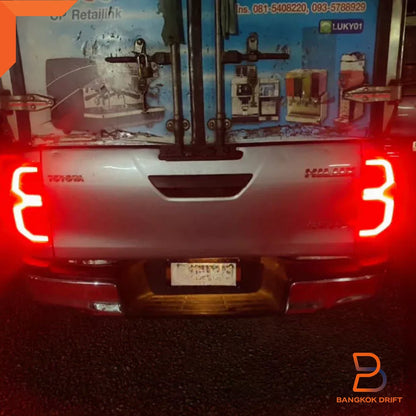Smoke GR Sport LED Red Tail Lamp Welcome Light for Toyota Hilux Ute (15-24)